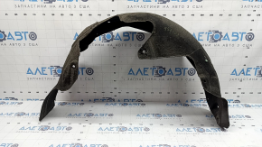 The rear left fender liner of a Kia Niro 17-19 HEV, PHEV, is dented, the fasteners are torn
