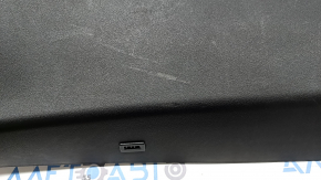 The lower trim panel of the tailgate of the Land Rover Range Rover Velar 18-23 is black, worn, the fastener is broken