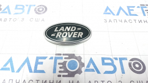 The LAND ROVER emblem is on the tailgate of the Land Rover Range Rover Velar 18-23.