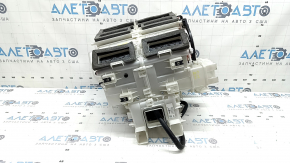 The bare heater housing of a Mitsubishi Outlander 22-26 air conditioner under 3 zones.