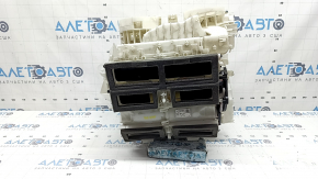 The bare heater housing of a Mitsubishi Outlander 22-26 air conditioner under 3 zones.