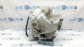 The bare heater housing of a Mitsubishi Outlander 22-26 air conditioner under 3 zones.