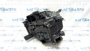 The bare heater housing of the Hyundai Santa FE 21-23 2.5, 2.5T air conditioner without radiators and actuators, the mount is broken.