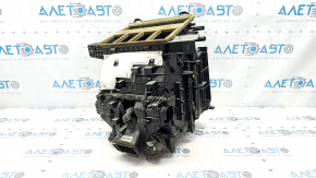 The bare heater housing of the Hyundai Santa FE 21-23 2.5, 2.5T air conditioner without radiators and actuators, the mount is broken.