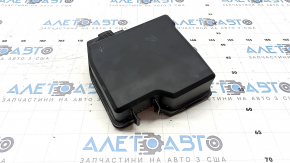 The underhood fuse box cover of a Hyundai Santa FE 21-23 has a broken latch.