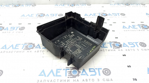 The underhood fuse box cover of a Hyundai Santa FE 21-23 has a broken latch.