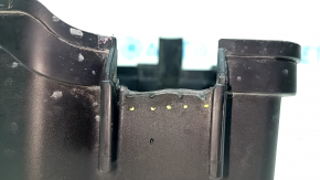 The underhood fuse box cover of a Hyundai Santa FE 21-23 has a broken latch.