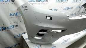 Bare front bumper for a Land Rover Range Rover Velar 18-20 with parking sensors and without Park Assist, white, scratches, chips, pinched, cracked