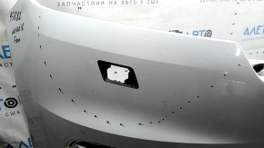Bare front bumper for a Land Rover Range Rover Velar 18-20 with parking sensors and without Park Assist, white, scratches, chips, pinched, cracked