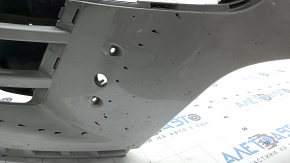 Bare front bumper for a Land Rover Range Rover Velar 18-20 with parking sensors and without Park Assist, white, scratches, chips, pinched, cracked