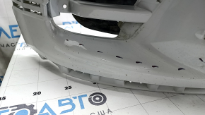 Bare front bumper for a Land Rover Range Rover Velar 18-20 with parking sensors and without Park Assist, white, scratches, chips, pinched, cracked