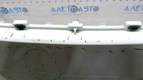 Bare front bumper for a Land Rover Range Rover Velar 18-20 with parking sensors and without Park Assist, white, scratches, chips, pinched, cracked