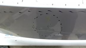 Bare front bumper for a Land Rover Range Rover Velar 18-20 with parking sensors and without Park Assist, white, scratches, chips, pinched, cracked