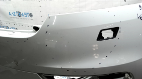 Bare front bumper for a Land Rover Range Rover Velar 18-20 with parking sensors and without Park Assist, white, scratches, chips, pinched, cracked