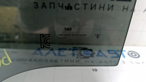 Tinted rear left door glass for a Porsche Cayenne 19-26