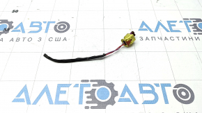 The front right airbag sensor chip for the 19-26 Porsche Cayenne is mounted on a TV.