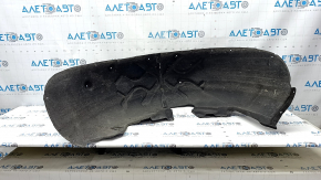 The rear left fender liner of a 19-23 Porsche Cayenne is torn at the seam.