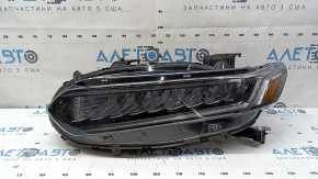 Left front headlight for a Honda Accord 18-22 Touring hybrid, needs polishing, cracked mount