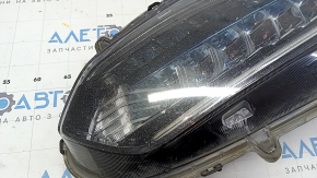 Left front headlight for a Honda Accord 18-22 Touring hybrid, needs polishing, cracked mount