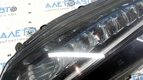 Left front headlight for a Honda Accord 18-22 Touring hybrid, needs polishing, cracked mount