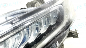 Left front headlight for a Honda Accord 18-22 Touring hybrid, needs polishing, cracked mount