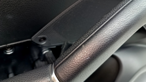 Front left door panel for a Porsche Cayenne 19-23 Bose, black leatherette, with backlighting, black leather armrest, scratches
