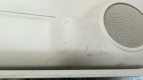 Front left door panel for Nissan Rogue 17-20, beige with black leather insert, beige leather armrest, with memory foam insert, worn, dry-cleanable