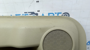 Front right door panel for Nissan Rogue 17-20, beige with black leather insert, beige leather armrest, with overlay, worn, ready for dry cleaning