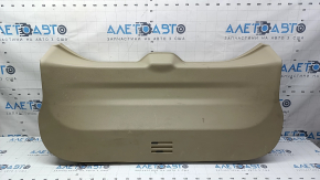Lower tailgate trim for a 14-20 Nissan Rogue, beige, scratches, needs dry cleaning, plastic has turned white