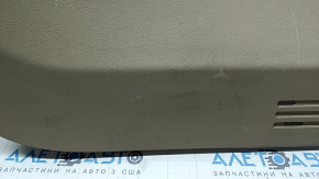 Lower tailgate trim for a 14-20 Nissan Rogue, beige, scratches, needs dry cleaning, plastic has turned white