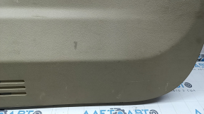Lower tailgate trim for a 14-20 Nissan Rogue, beige, scratches, needs dry cleaning, plastic has turned white