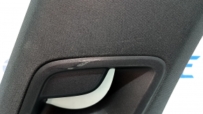 The rear pillar trim in front of the upper left window of a Porsche Cayenne 19-26 is black, worn, the fasteners are broken