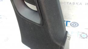 The rear pillar trim in front of the upper right window of the Porsche Cayenne 19-26 is black, worn, the fasteners are broken