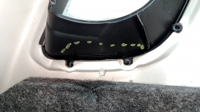 The rear pillar trim in front of the upper right window of the Porsche Cayenne 19-26 is black, worn, the fasteners are broken