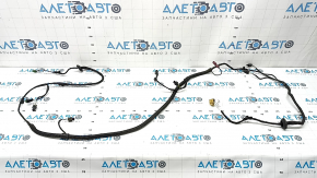 The wiring for the rear bumper of a 19-23 Porsche Cayenne for parking sensors is torn.