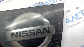 Nissan Rogue 17-18 front grille emblem, square, radar-ready, polished, broken mount, chips