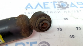 Rear left shock absorber for Nissan Rogue 14-17 awd, small silent block, dented, rusty, microcracks