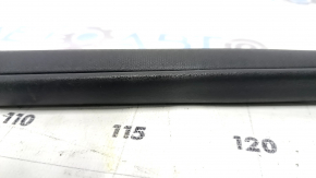 The front right door seal of the Nissan Rogue 14-20 has come apart at the seam and is worn out.
