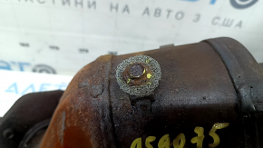 The exhaust manifold with a catalytic converter for a Nissan Rogue 14-17 type 1 is rusty and has broken bolts.