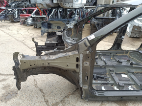 Front left quarter panel of a 14-20 Nissan Rogue on the body, green, bumper