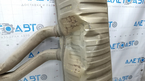 The exhaust pipe, the middle part with the barrel of the Porsche Cayenne 19-26 3.0T, is dented, torn