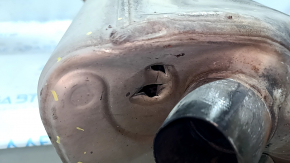 The exhaust pipe, the middle part with the barrel of the Porsche Cayenne 19-26 3.0T, is dented, torn
