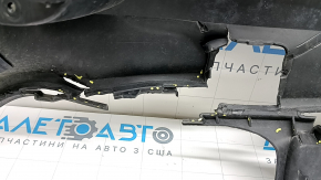 The rear bumper lip of a Porsche Cayenne 19-23, structured for parking sensors, Base, S, is broken, torn, scratched, and missing fragments.