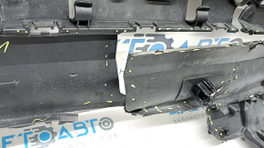 The rear bumper lip of a Porsche Cayenne 19-23, structured for parking sensors, Base, S, is broken, torn, scratched, and missing fragments.