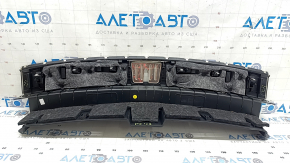 The trunk opening trim for a Porsche Cayenne 19-26 is black, with scratches and broken guides.