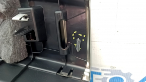 The trunk opening trim for a Porsche Cayenne 19-26 is black, with scratches and broken guides.