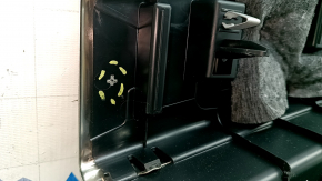 The trunk opening trim for a Porsche Cayenne 19-26 is black, with scratches and broken guides.