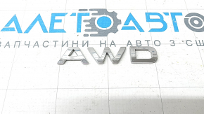 AWD emblem on the front left fender of a Kia Sportage 17-22