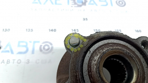 The rear right hub of a Ford Bronco Sport 21-26 AWD is rusty and has a broken bolt.