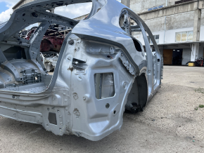 Rear right quarter wing of a 19-26 Porsche Cayenne on the body, silver, dented side member